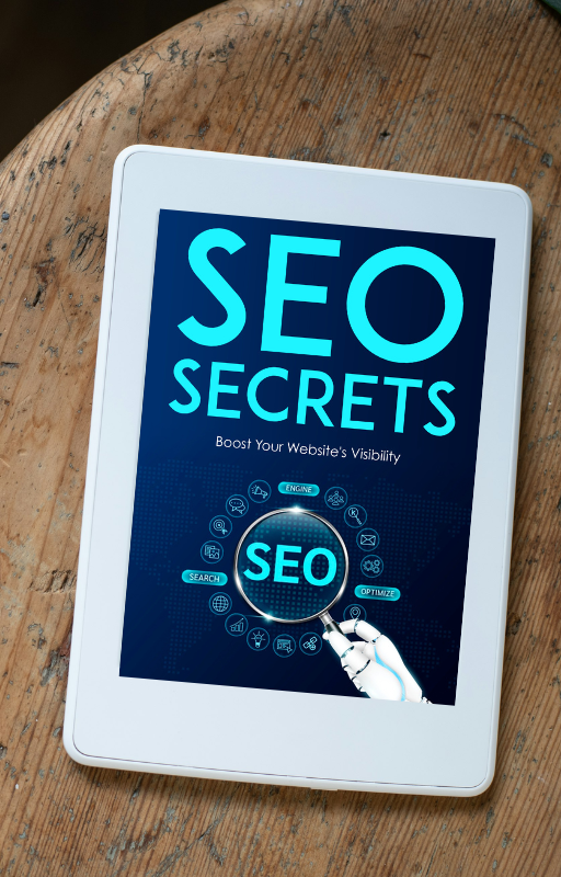 Tablet displaying 'SEO Secrets: Boost Your Website's Visibility' eBook cover on a wooden table
